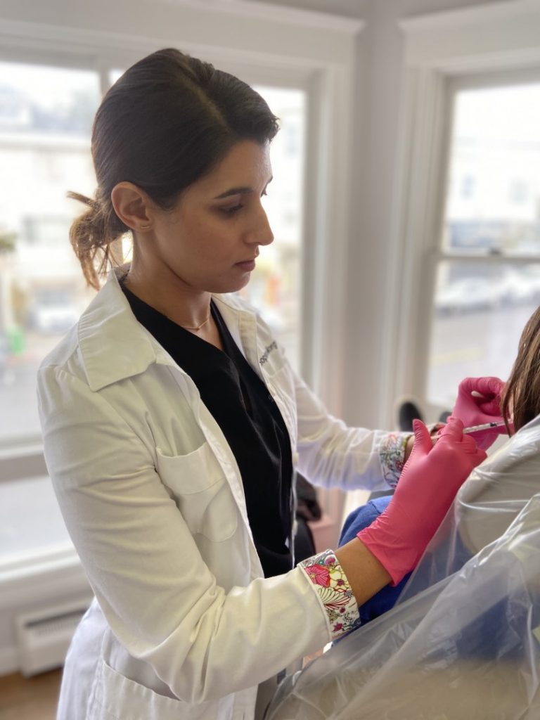 Dr. Morghem injecting Botox