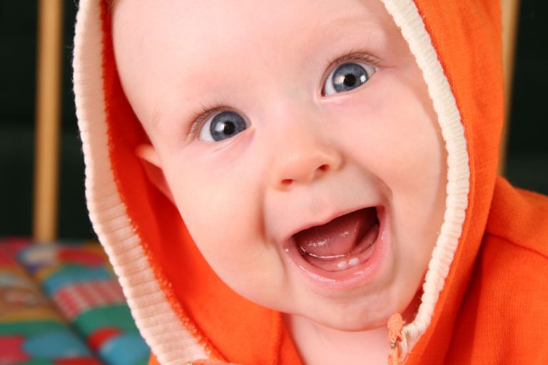 Smiling child with baby teeth | Child oral health