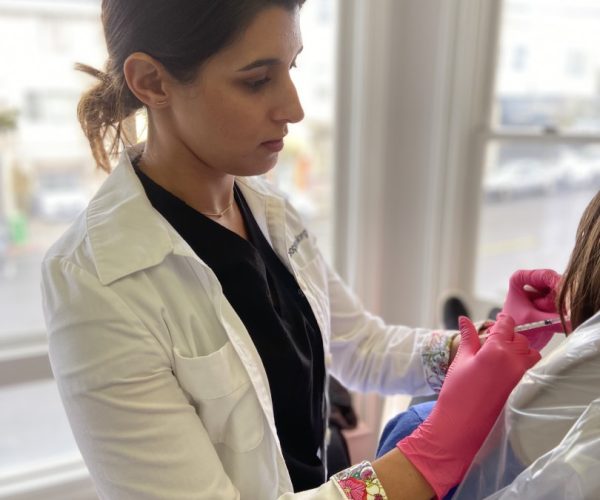Dr. Morghem injecting Botox